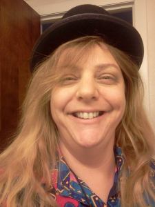 This is me wearing my very stylish top hat. My stovepipe hat is taller and is one I wear with my super hero cape. 